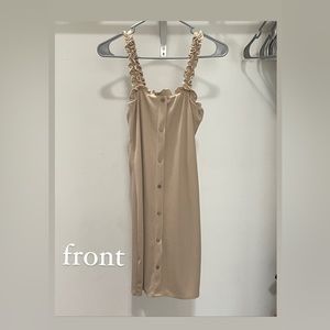 this dress is just above knee level and is more of a baggy style.